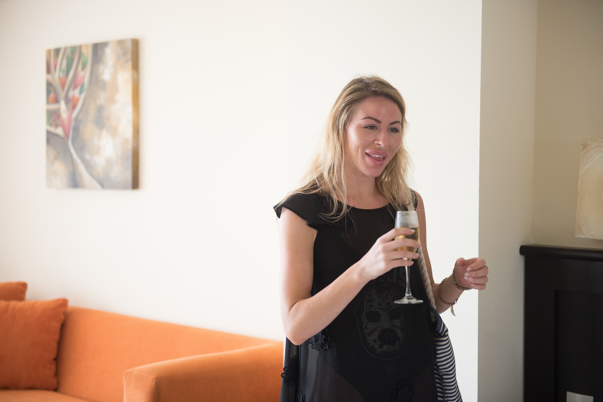 Friend of the bride with a glass of champagne