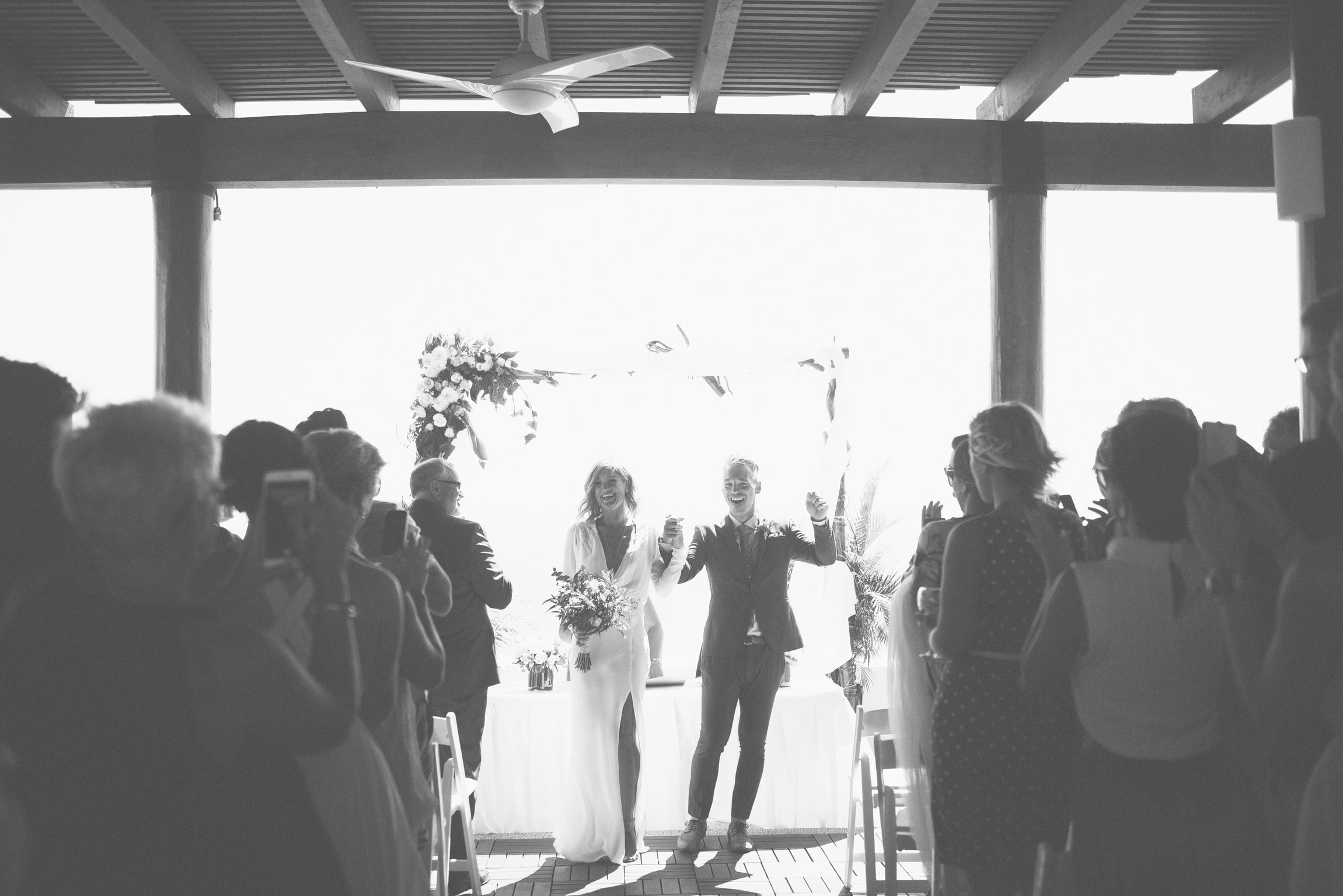 Bride and groom coming back down the aisle 