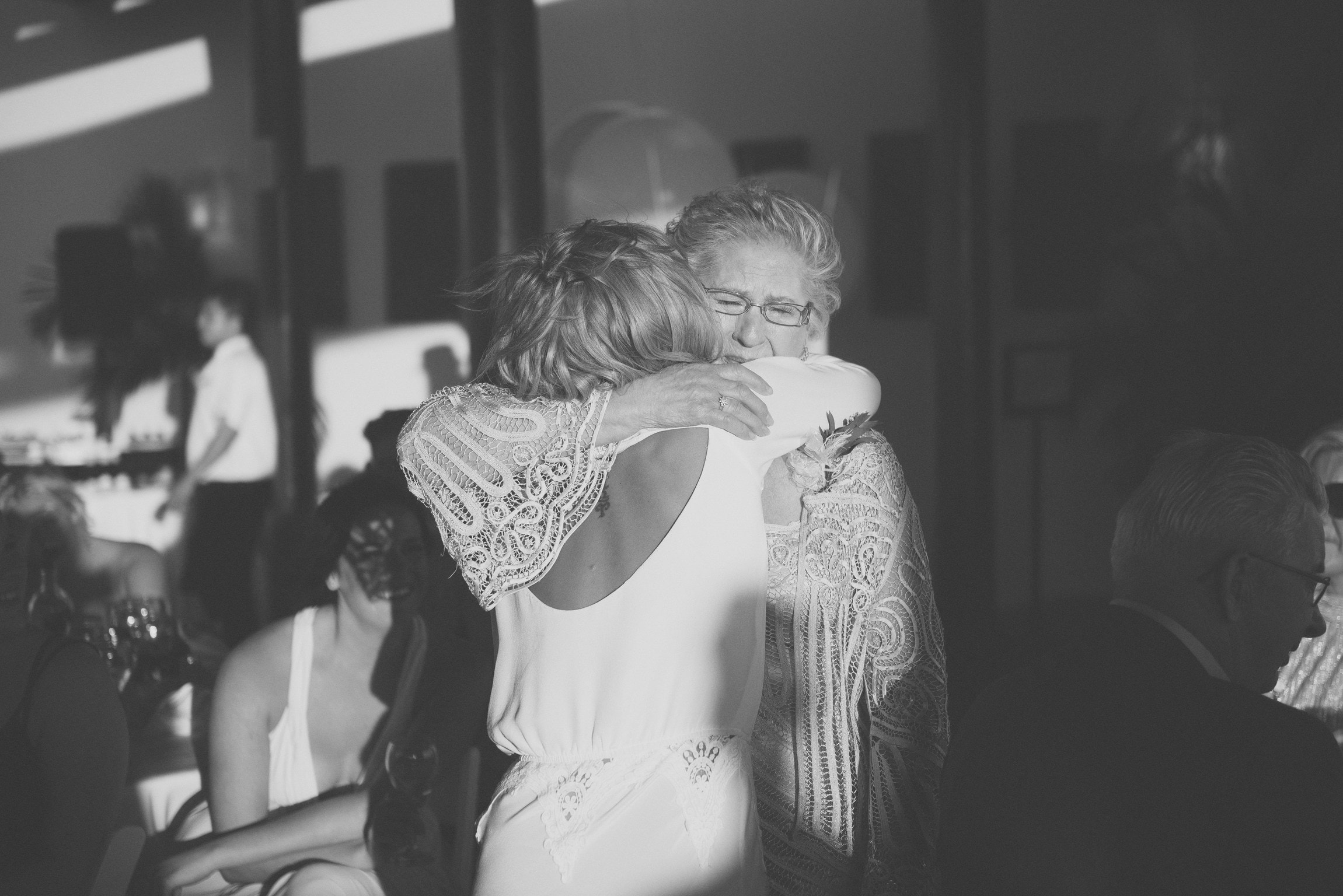 Bride hugs grandmother 