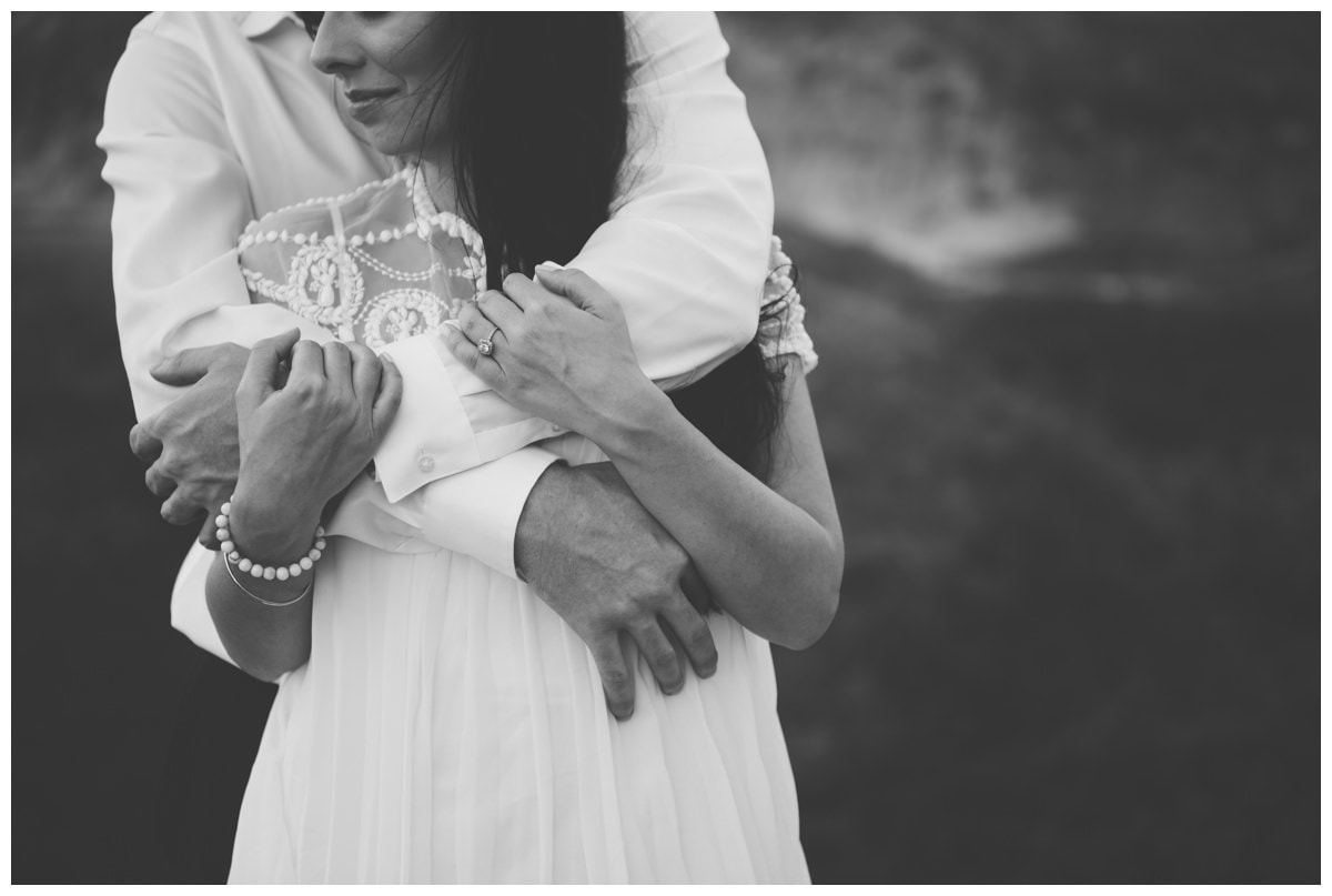 black and white image of couple embraced