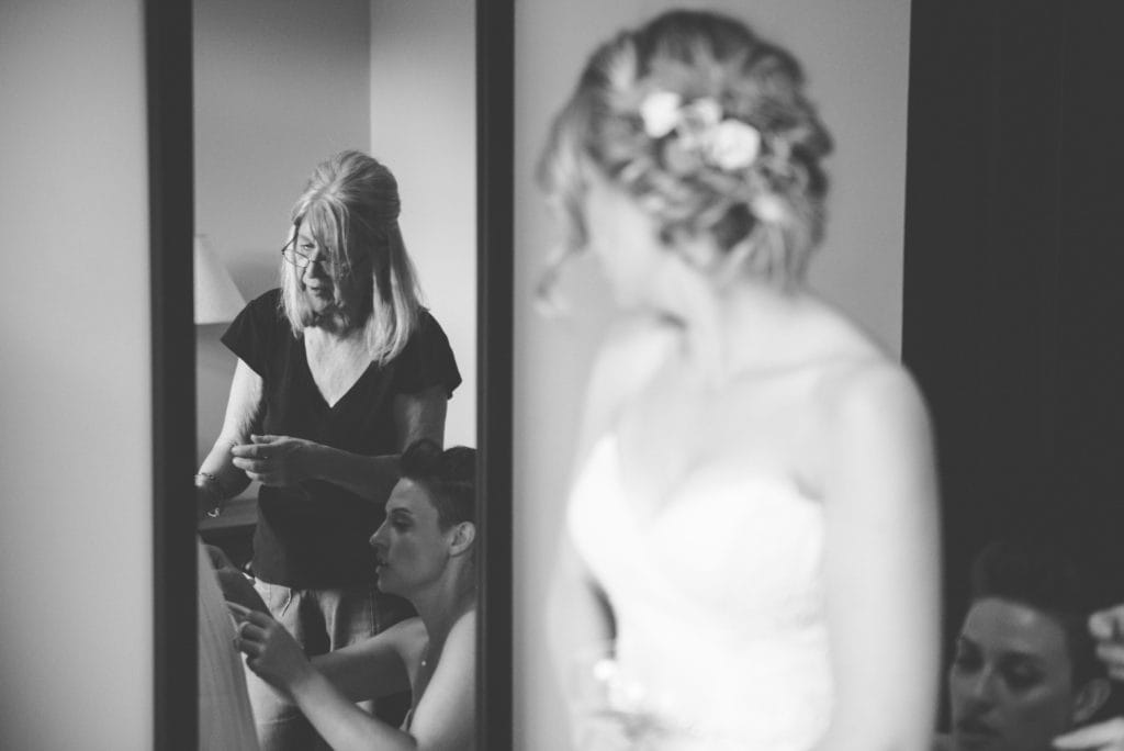 a year in review bride watches mother do up dress 
