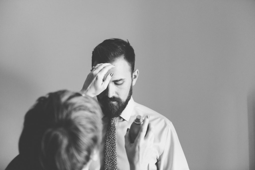 a year in review groom getting his hair touched up moments before the ceremony