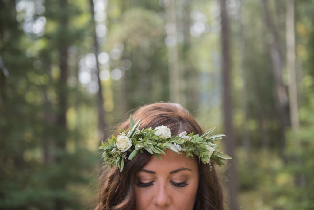 a year in review bride wearing flower crown in Canmore Wedding