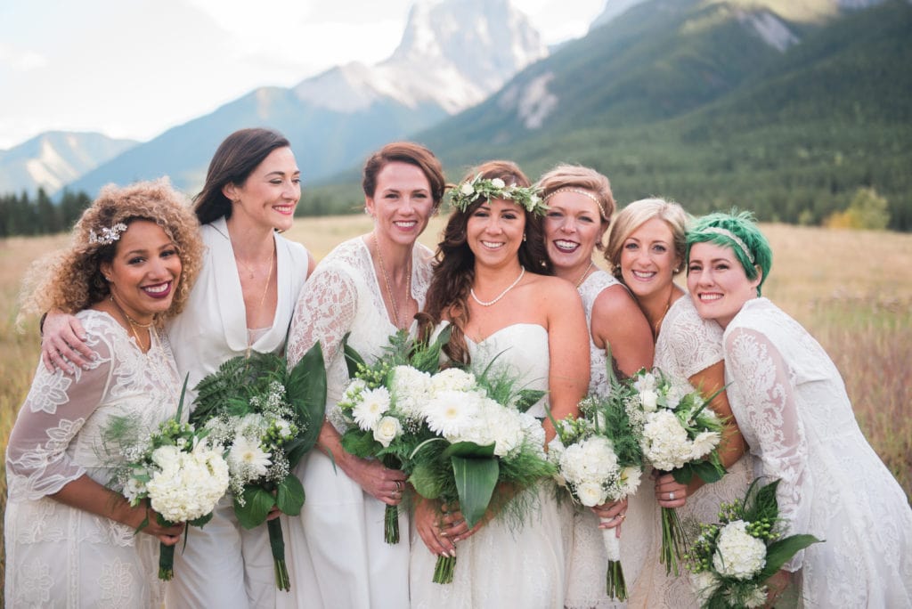 a year in review bride and her bridesmaids with gorgeous mountain backdrop