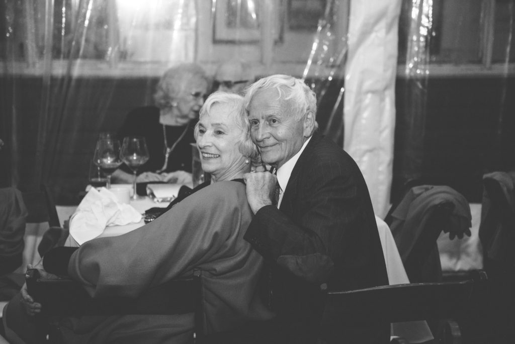 a year in review older couple sits and watches dance 