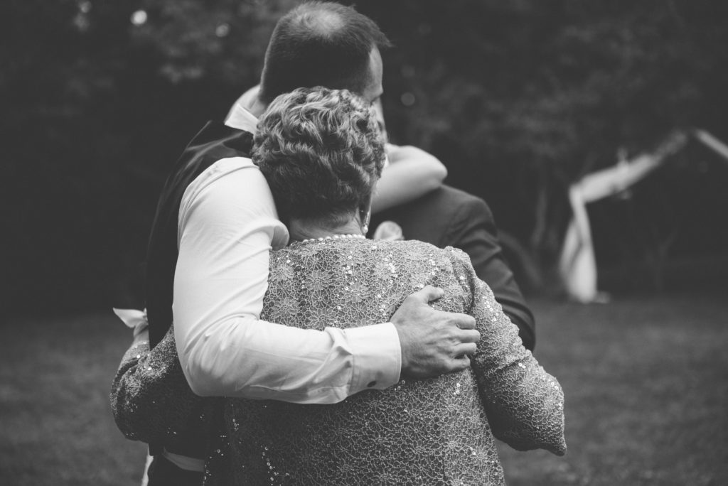 a year in review groom embraces mother 