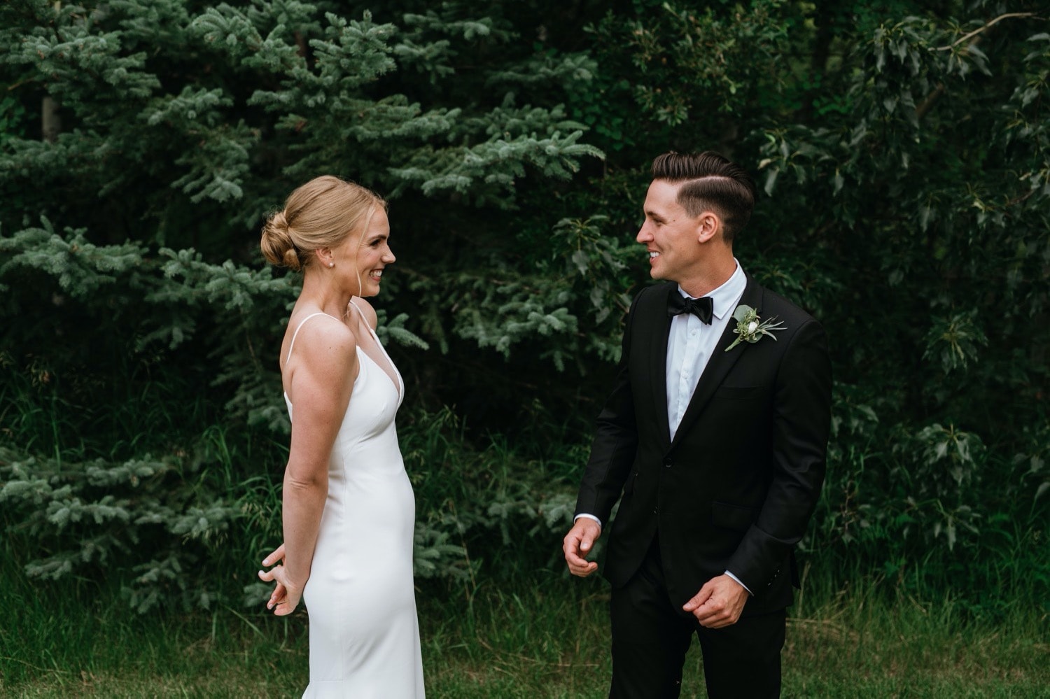 Bride and groom first look summer time