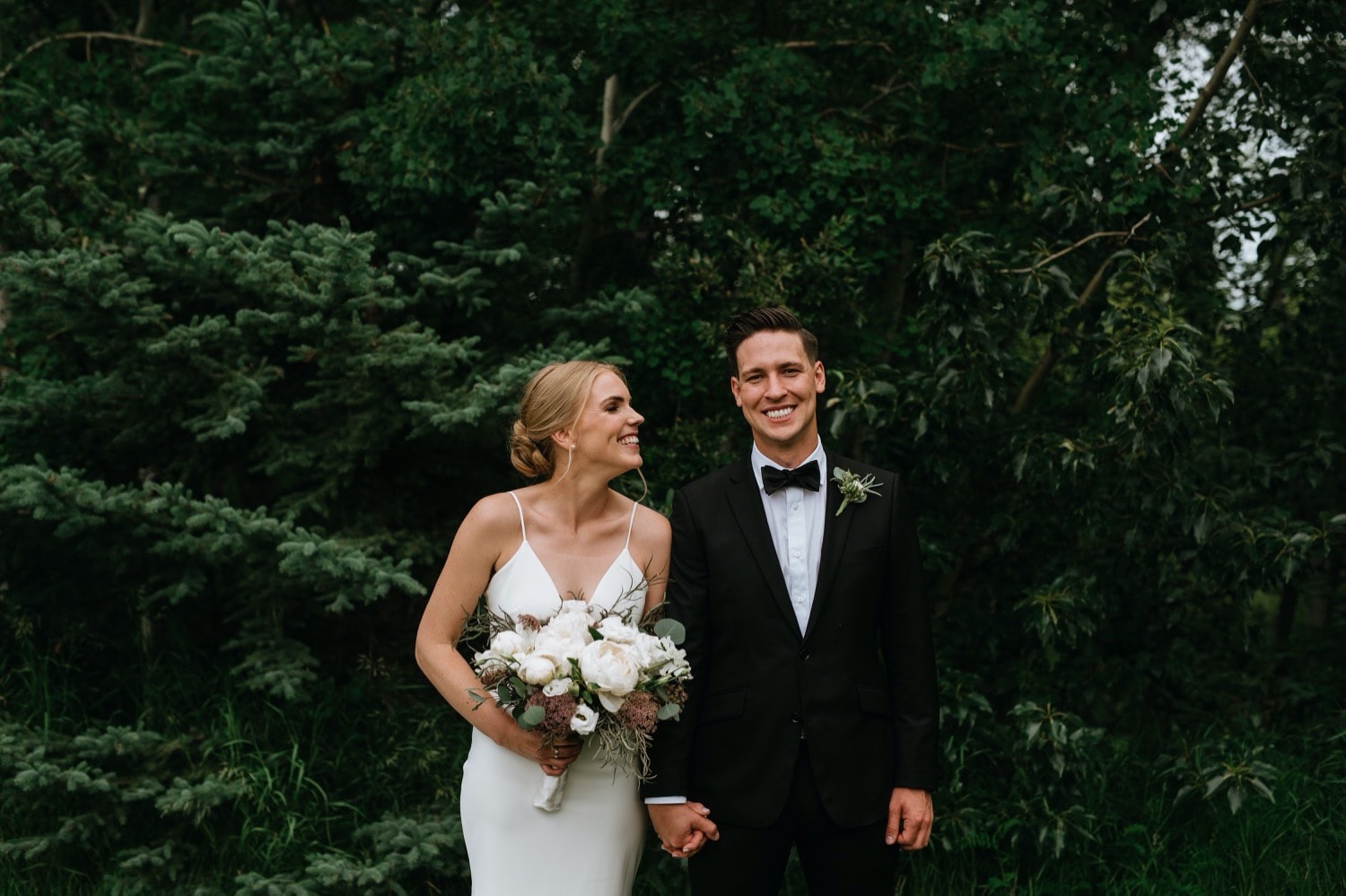 Bride and groom first look summer time