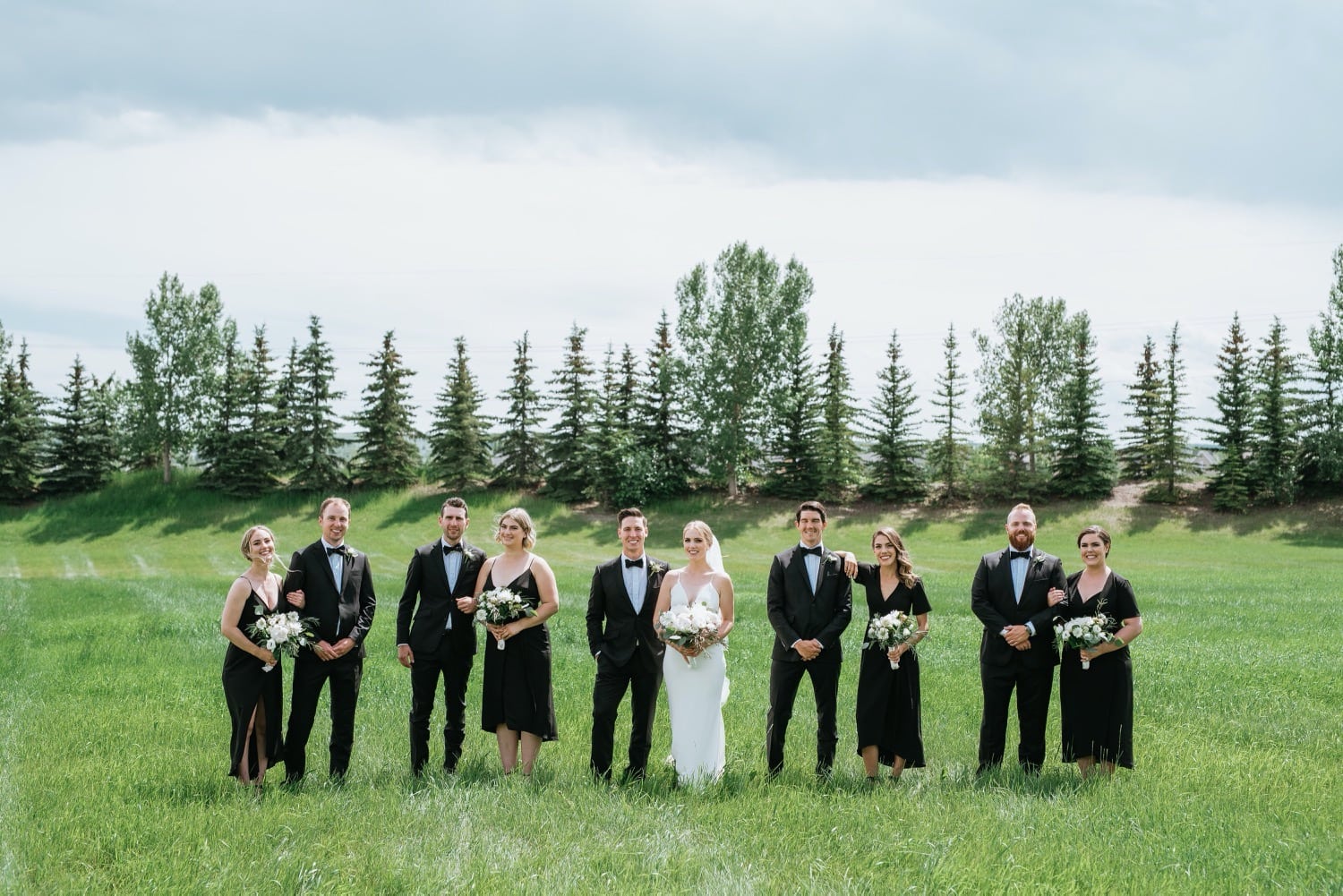 Bridal party in field