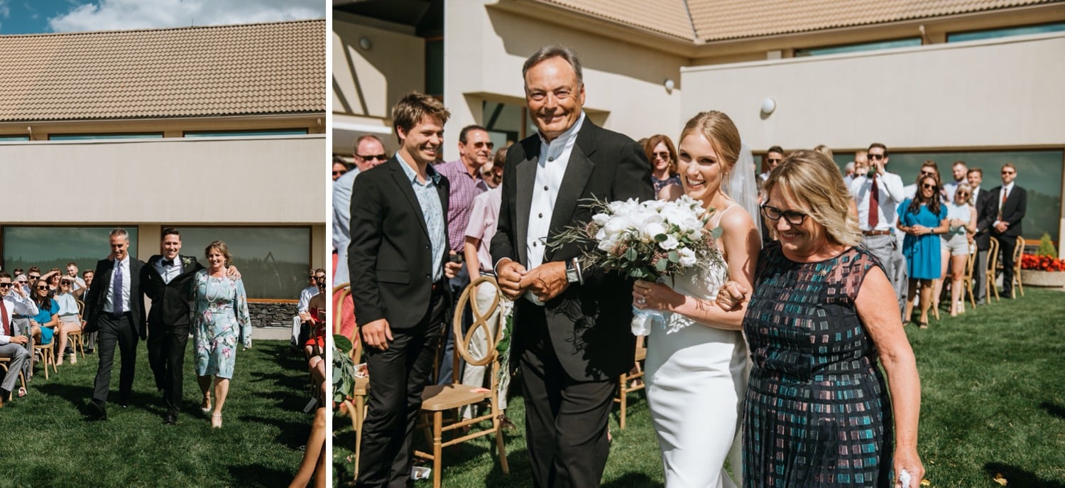 Bride and groom coming down the aisle with parents